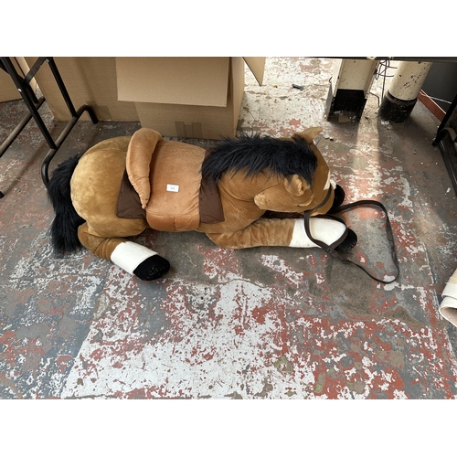 1113 - An E&J large horse soft toy