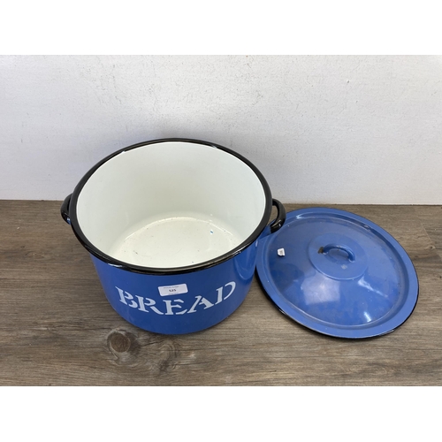 525 - A mid 20th century blue and white enamel two handled lidded bread bin - approx. 20cm high x 30cm dia... 