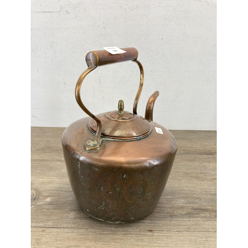 526 - A 19th century copper kettle - approx. 32cm high