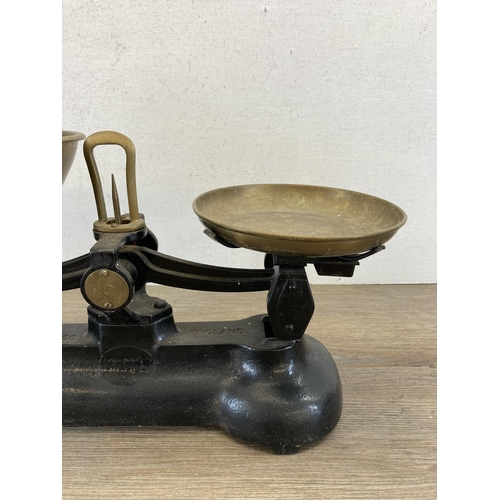 528 - A set of 19th century Libra Scale Co. cast iron and brass kitchen weighing scales