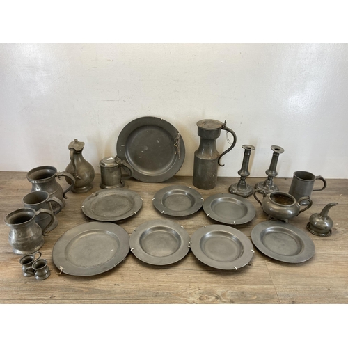 531 - A collection of 19th century and later pewter to include dinner plates, tankards etc.