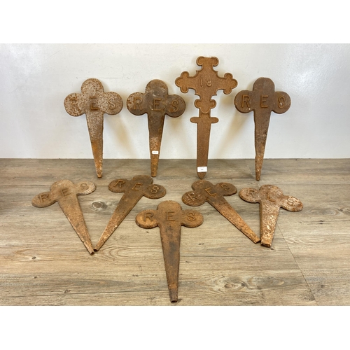 533 - Nine 19th century gothic revival cast iron grave markers, eight reserved and one number 18