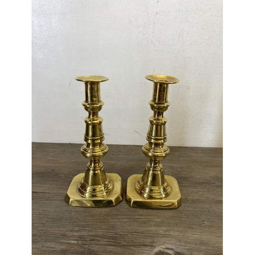 534 - Nine pieces of 19th century and later brassware, four pairs of candlesticks - largest approx. 23cm h... 