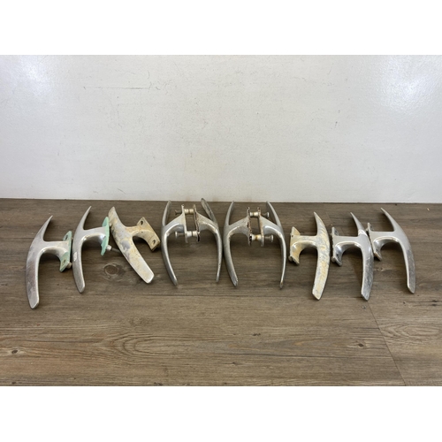 542 - Five pairs of mid 20th century Dryad H117 cast aluminium door handles