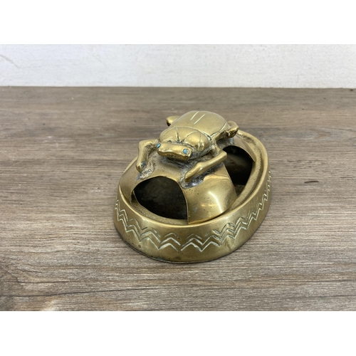 559 - An antique Egyptian Revival engraved brass scarab beetle ashtray - approx. 14.5cm long x 10cm wide