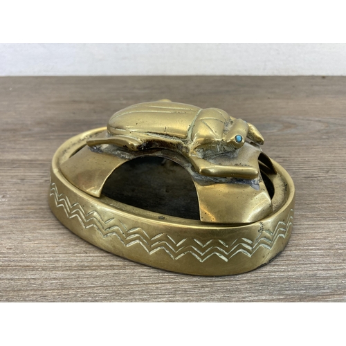 559 - An antique Egyptian Revival engraved brass scarab beetle ashtray - approx. 14.5cm long x 10cm wide