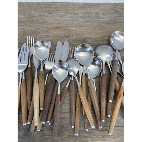 562 - A collection of 1960s Wallin Brothers of Sweden 'Safir' teak and stainless steel cutlery