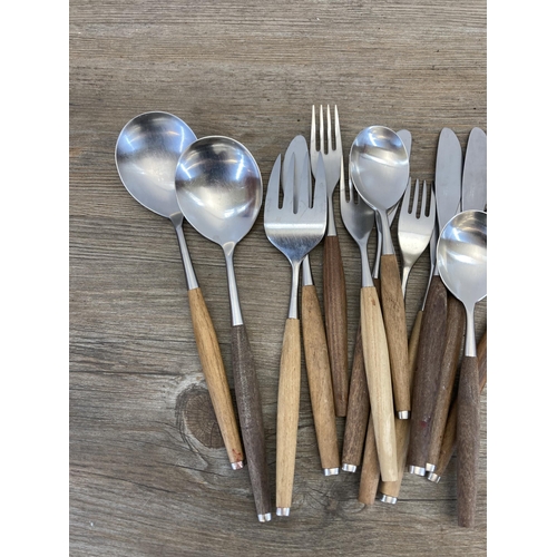 562 - A collection of 1960s Wallin Brothers of Sweden 'Safir' teak and stainless steel cutlery