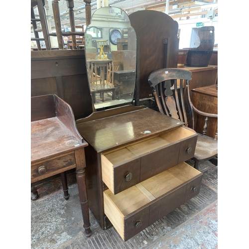 181 - A mid 20th century oak dressing table with upper mirror