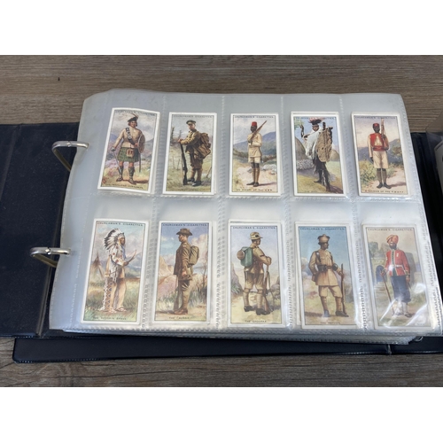 621 - Two albums containing a large collection of cigarette cards to include Carreras Cigarettes, Ogden's ... 