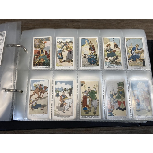 621 - Two albums containing a large collection of cigarette cards to include Carreras Cigarettes, Ogden's ... 