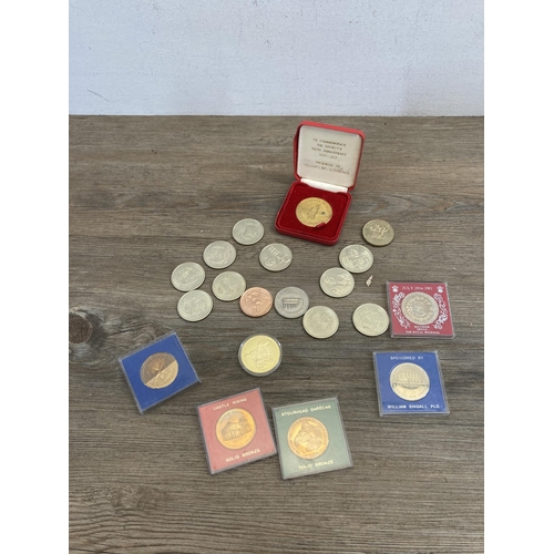 623 - A collection of commemorative medals to include 2006 'Una and the Lion' five pounds copy, Thames Bar... 