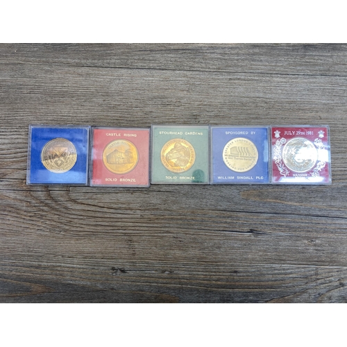 623 - A collection of commemorative medals to include 2006 'Una and the Lion' five pounds copy, Thames Bar... 