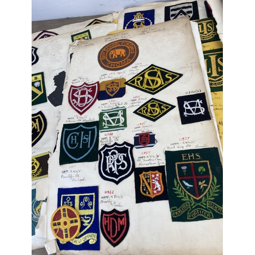 630 - A large collection of vintage college embroidered cloth patches