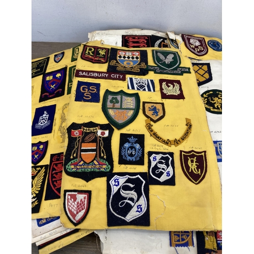 630 - A large collection of vintage college embroidered cloth patches