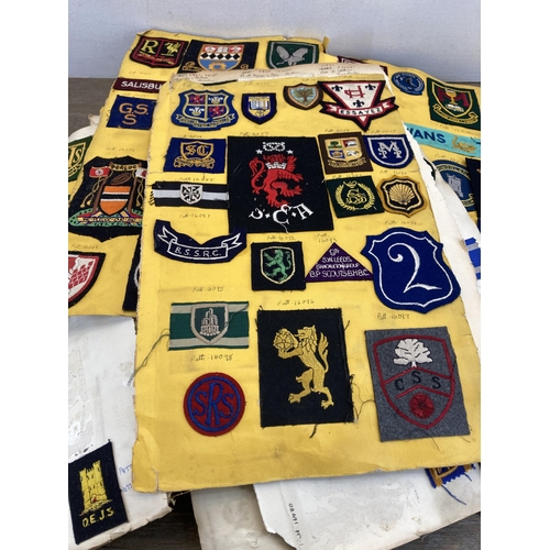 630 - A large collection of vintage college embroidered cloth patches