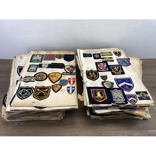 631 - A large collection of vintage college embroidered cloth patches