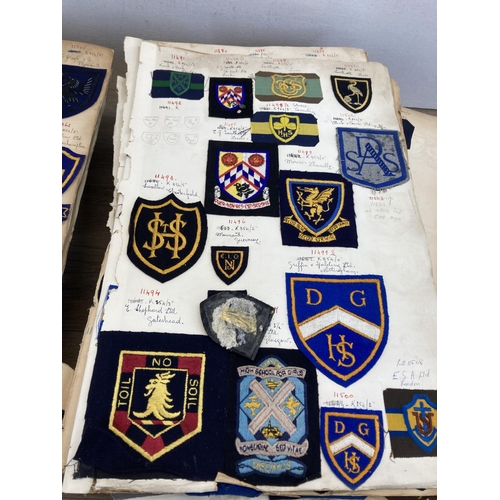 631 - A large collection of vintage college embroidered cloth patches