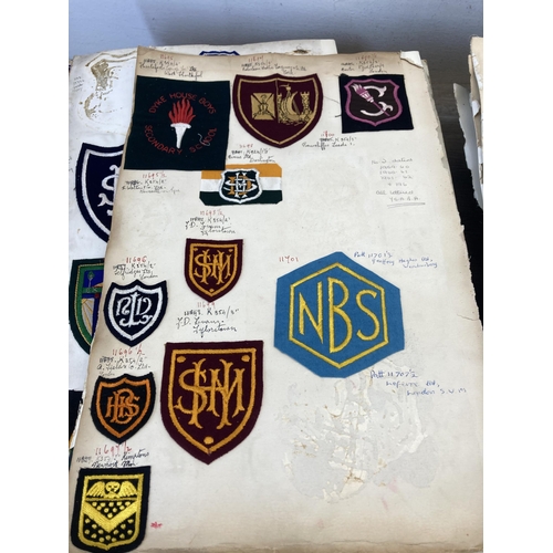 631 - A large collection of vintage college embroidered cloth patches