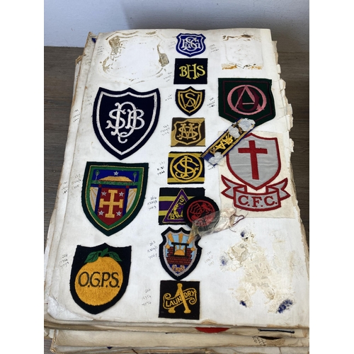 631 - A large collection of vintage college embroidered cloth patches