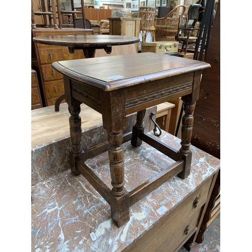203 - A 17th century style carved oak joint side table - approx. 46cm high x 44cm wide x 29cm deep