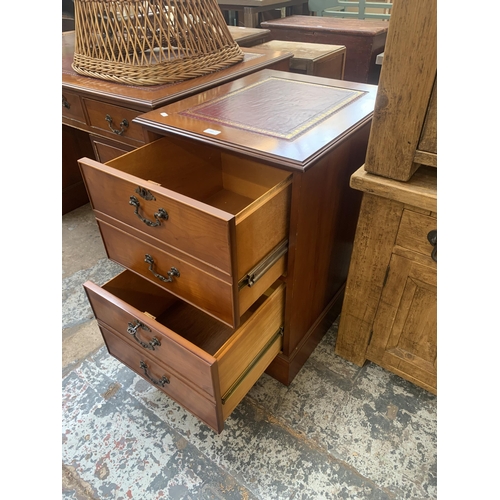 213 - A 19th century style yew wood and red leather topped two drawer office filing cabinet - approx. 75cm... 