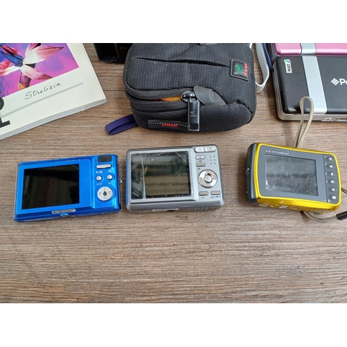 A collection of Polaroid items to include iS525 16mp compact digital