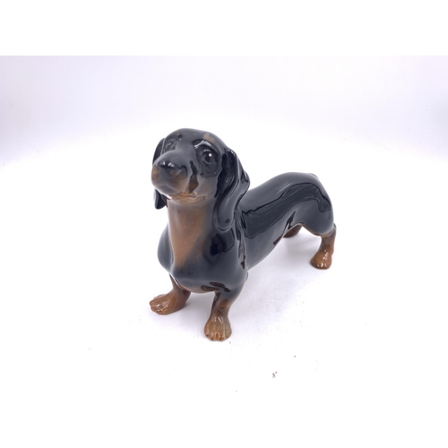 406 - Nine Beswick animal figurines to include Dachshund, Bullfinch, Beneagles Scotch Whisky Loch Ness Mon... 