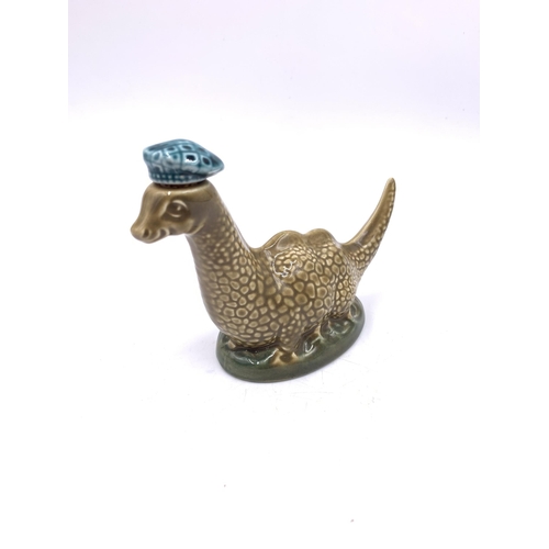 406 - Nine Beswick animal figurines to include Dachshund, Bullfinch, Beneagles Scotch Whisky Loch Ness Mon... 