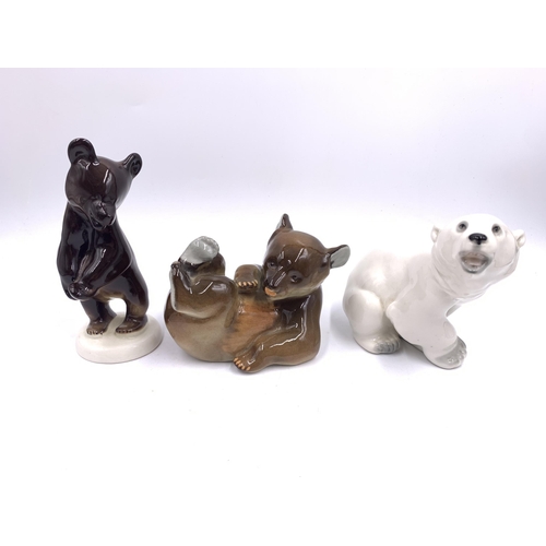 415 - Nine vintage USSR Lomonosov ceramic animal figurines to include panda, seal, brown bear, polar bear,... 