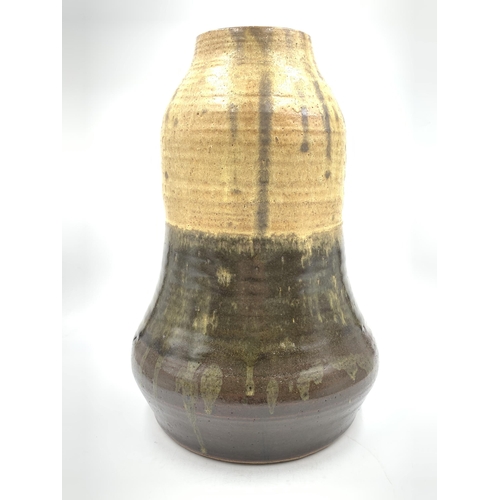 417 - A mid 20th century studio pottery glazed vase, signed C. B to base - approx. 37cm high