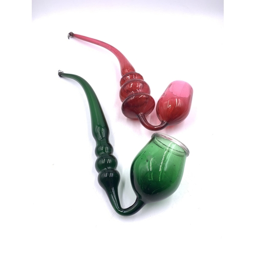 422 - Two Victorian Nailsea glass pipes, one cranberry and one green - largest approx. 39cm long