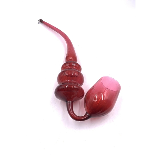 422 - Two Victorian Nailsea glass pipes, one cranberry and one green - largest approx. 39cm long