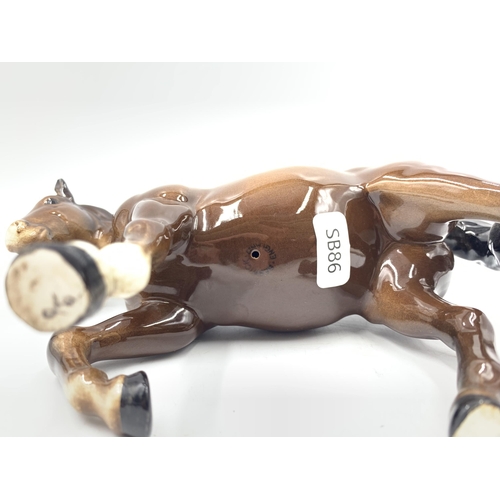 425 - A Beswick Stocky Jogging Mare brown gloss horse figurine, model no.855 - approx. 15cm high