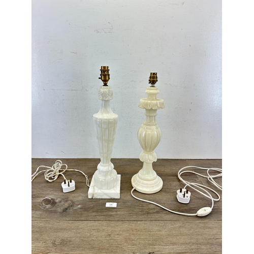 634 - Two carved alabaster table lamps - approx. 47cm high