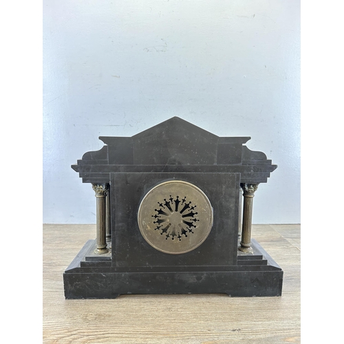 643 - A 19th century black slate and brass chiming mantel clock with Corinthian column sides and arched to... 