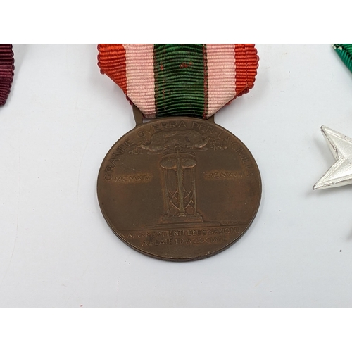 2145 - Seven Italian medals to include WWI Victory, Order of Vittorio Veneto, WWI Unity etc.