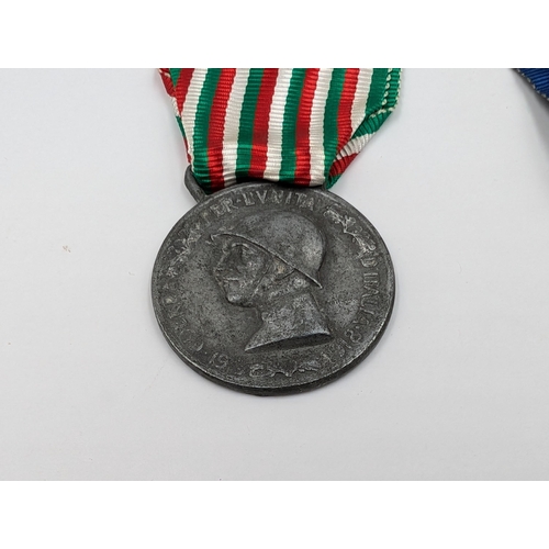 2145 - Seven Italian medals to include WWI Victory, Order of Vittorio Veneto, WWI Unity etc.