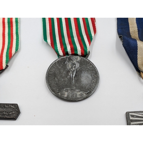 2145 - Seven Italian medals to include WWI Victory, Order of Vittorio Veneto, WWI Unity etc.