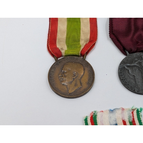 2145 - Seven Italian medals to include WWI Victory, Order of Vittorio Veneto, WWI Unity etc.