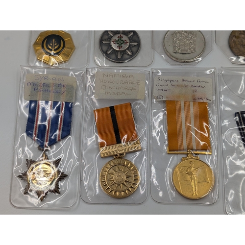 2147 - Ten various medals to include Syrian Medal For Bravery, Singapore Armed Forces Good Service, Namibia... 