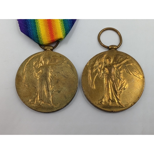 2153 - Two WWI British Victory medals, one presented to T-314329 Pte. A. J. Garbett A.S.C. and one presente... 