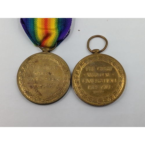 2153 - Two WWI British Victory medals, one presented to T-314329 Pte. A. J. Garbett A.S.C. and one presente... 