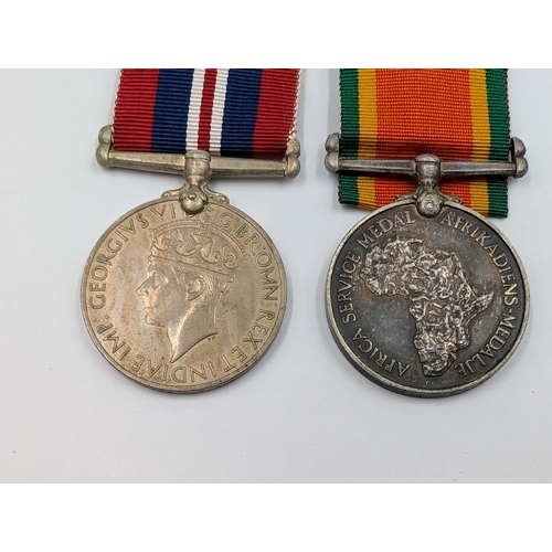 2155 - A WWII medal pair presented to 78809 W. F. Hart