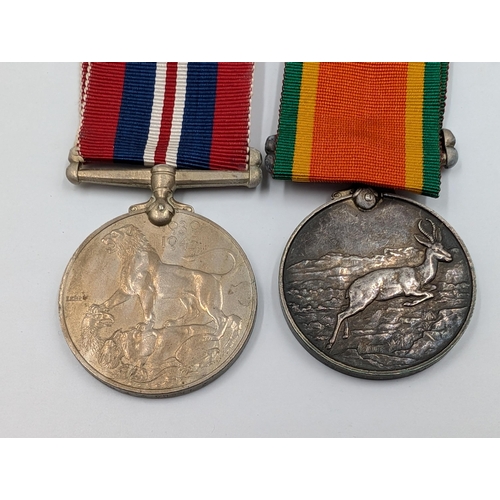 2155 - A WWII medal pair presented to 78809 W. F. Hart