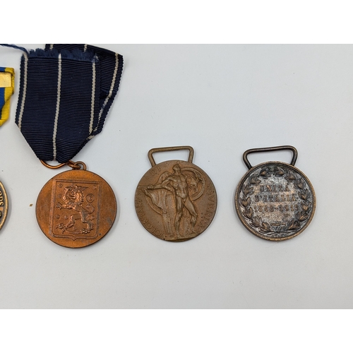 2157 - Ten various medals to include US Navy 1898 Spanish Campaign re-issue, WWI French Orient Campaign, It... 