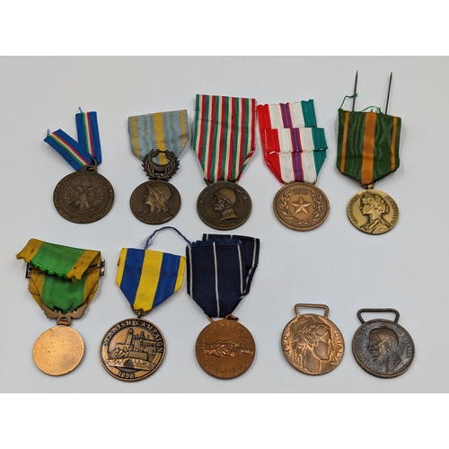 2157 - Ten various medals to include US Navy 1898 Spanish Campaign re-issue, WWI French Orient Campaign, It... 