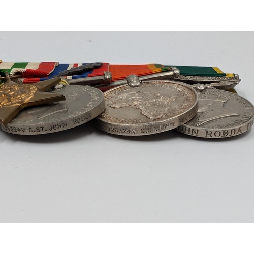 2165 - A WWII seven piece medal group presented to 126324V C. St. John Rodda comprising Military Cross insc... 