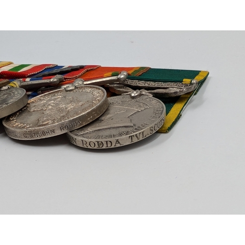 2165 - A WWII seven piece medal group presented to 126324V C. St. John Rodda comprising Military Cross insc... 