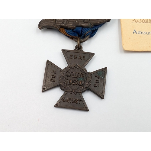 2167 - A 1920s JMC DSO Methodist Missionary Society medal awarded to Walter Avery